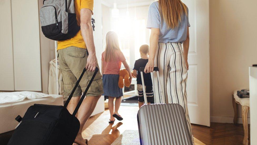 Family leaving for a holiday