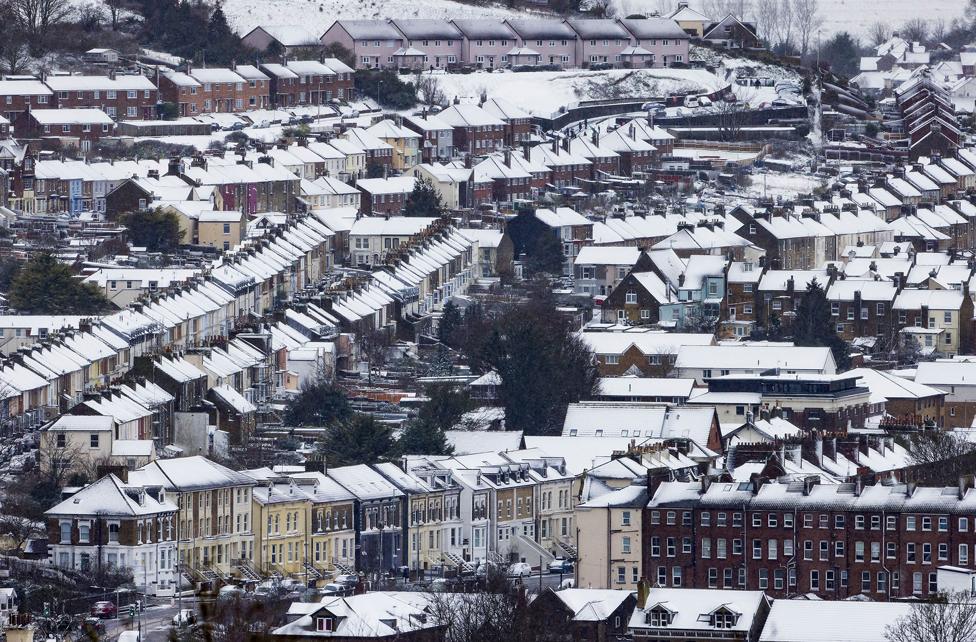 Snow covers houses in Dover, Kent, on 7 February 2021