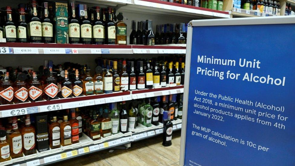 Alcohol on supermarket shelves in Galway, with minimum pricing sign