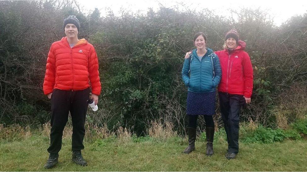 Dr Yani Berdeni socially distancing on a walk with his mother and sister