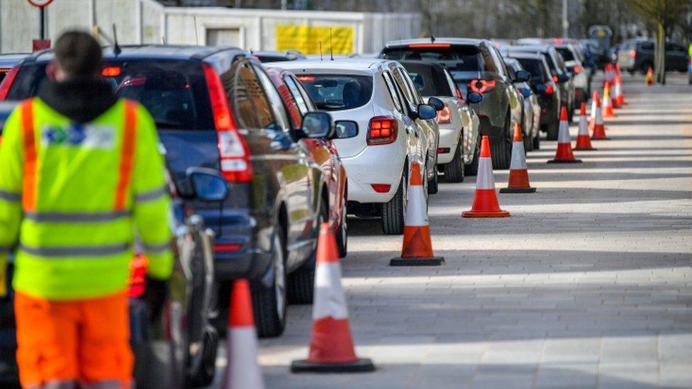 Cars queuing in a Bristol testing centre