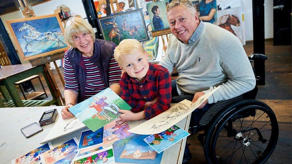 Brian Abram with grandson Charles and illustrator Lynne Hickin