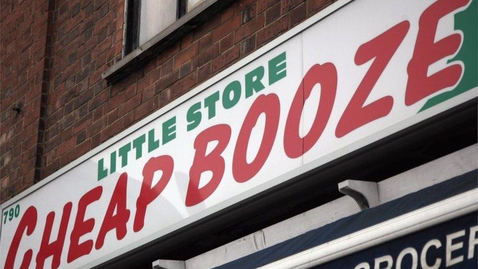 Cheap Booze sign over shop