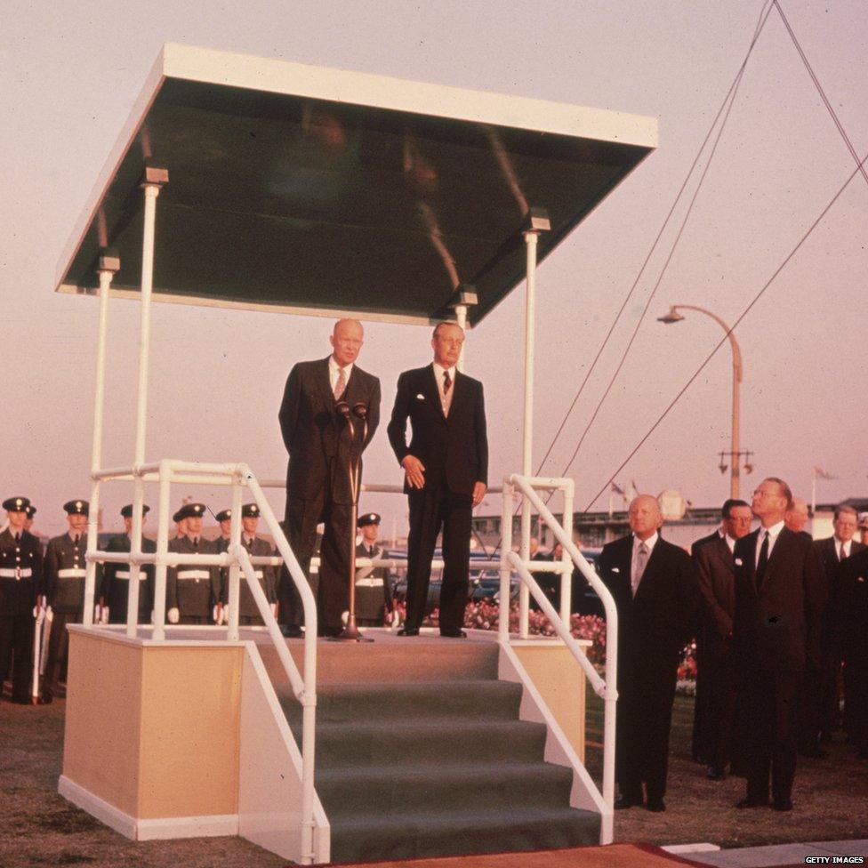 US President Dwight Eisenhower on the podium with Prime Minister Harold Macmillan at London airport, 1959