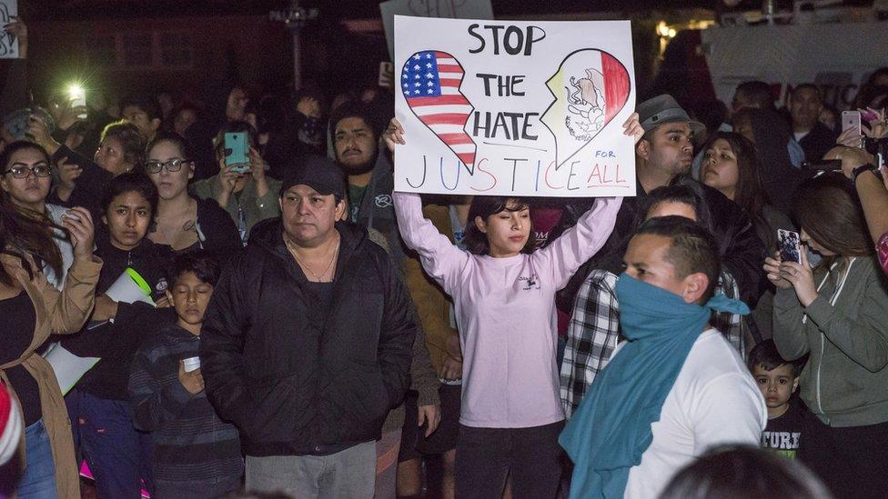 Protesters march towards the off-duty officer's home in Anaheim, California