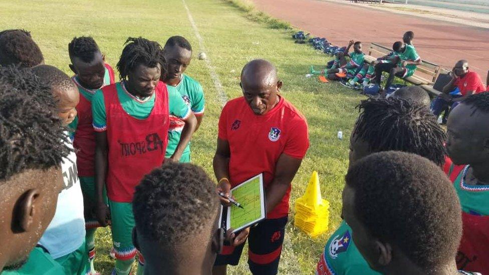 South Sudan coach Ashu Cyprian Besong explains tactics to his players