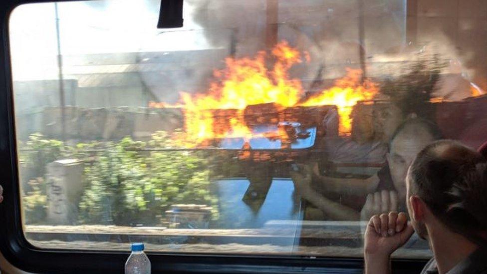 The fire through a train window