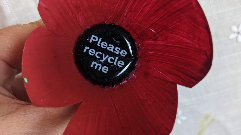 Red plastic poppy