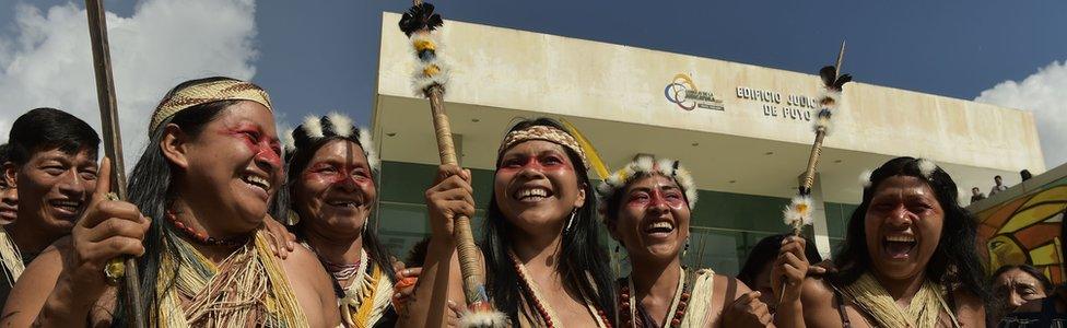 Nemonte Nenquimo (centre), celebrates with other Waorani after a court ruled in their favour in Puro, Ecuador, on April 26, 2019