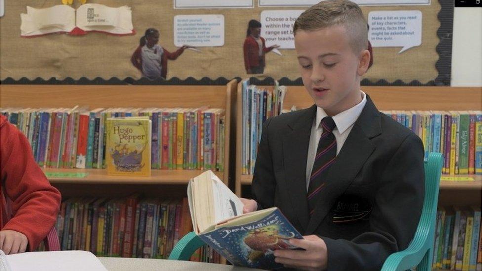 boy reads to Duchess of Cornwall on the phone