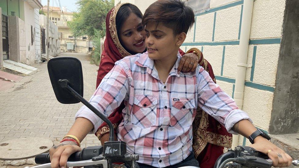 Dimple and Manisha seen on a motorbike