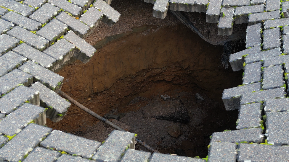 sinkhole in car park