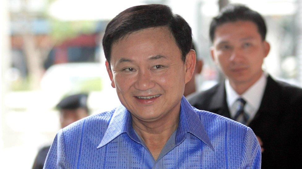 Thai Prime Minister Thaksin Shinawatra smiles as he arrives at Government House in Bangkok, 04 April 2006