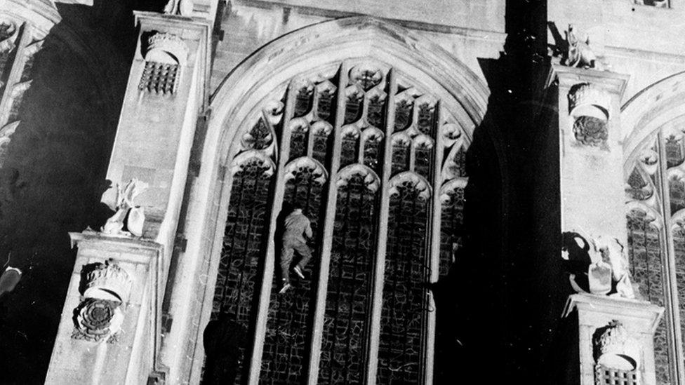 A Cambridge night climber outside King's College Chapel