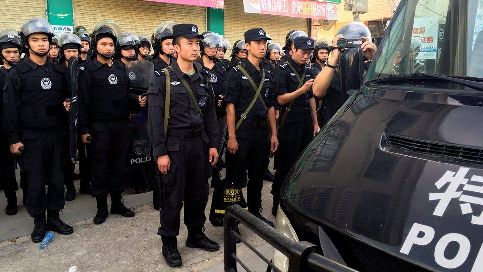 Police on patrol in Wukan, China