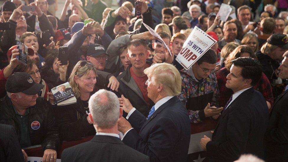 Donald Trump meets with fans at a campaign rally.