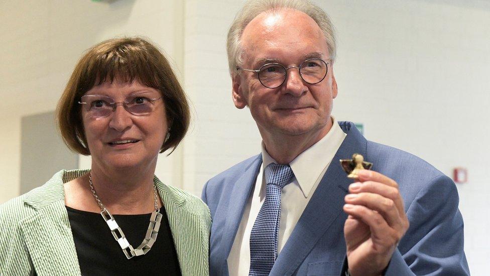 Saxony-Anhalt State Premier Reiner Haseloff of the Christian Democratic party (CDU), and his wife Gabriele, wait for the first election polls to be published for the federal state election of Saxony-Anhalt, in Magdeburg, Germany, June 6, 2021