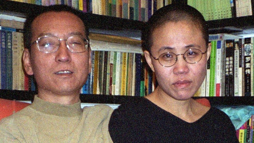 Chinese dissident and Nobel Peace laureate Liu Xiaobo (L) and his wife Liu Xia in Beijing