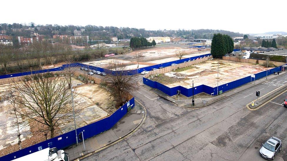 The Power Court site in Luton town centre as it looks today, surrounded by hoardings.