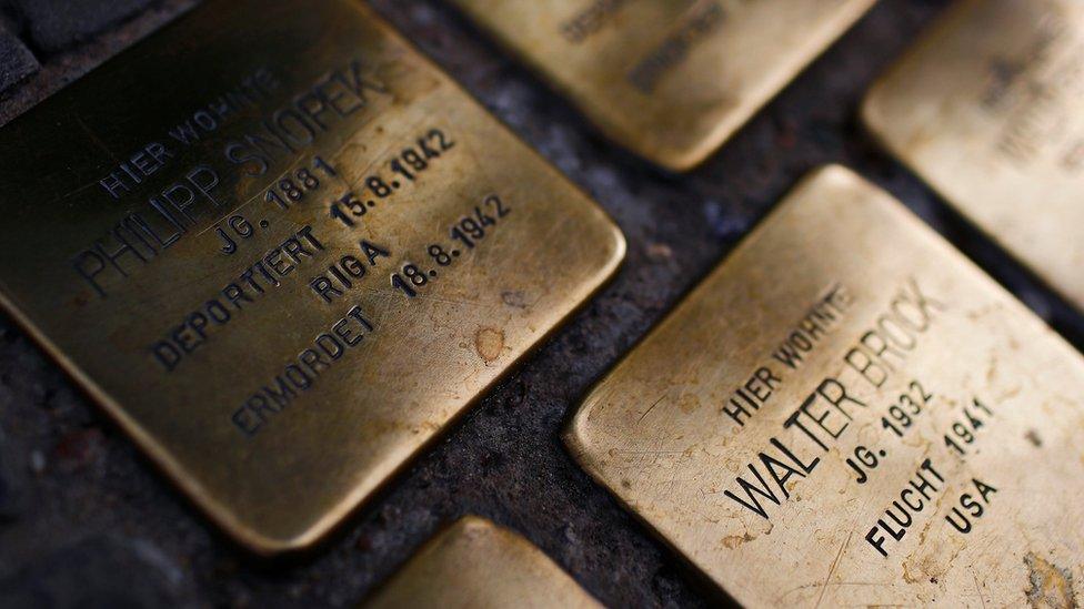 Ground plaques commemorating individuals who died in the Holocaust