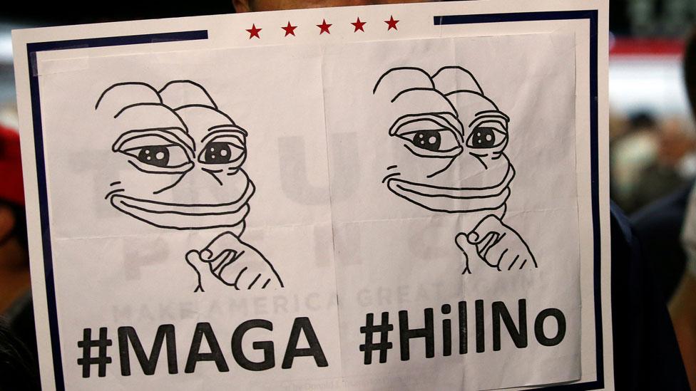 Trump supporter with Pepe sign