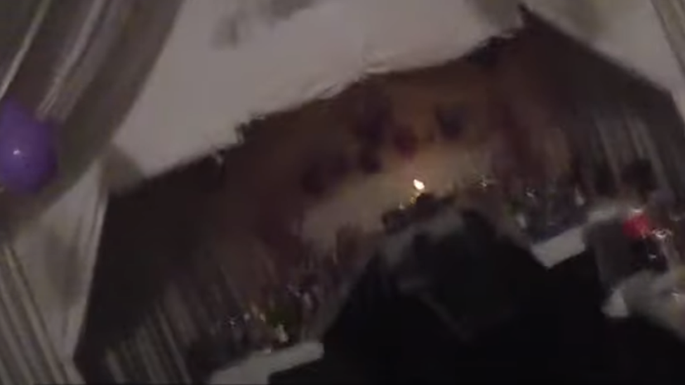 Police footage from the party