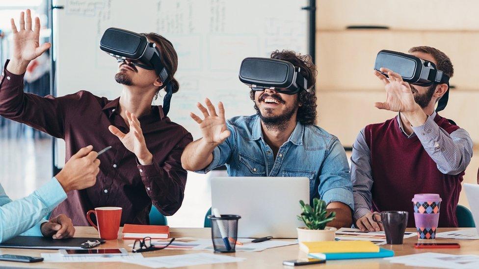 Three colleagues in a VR world together