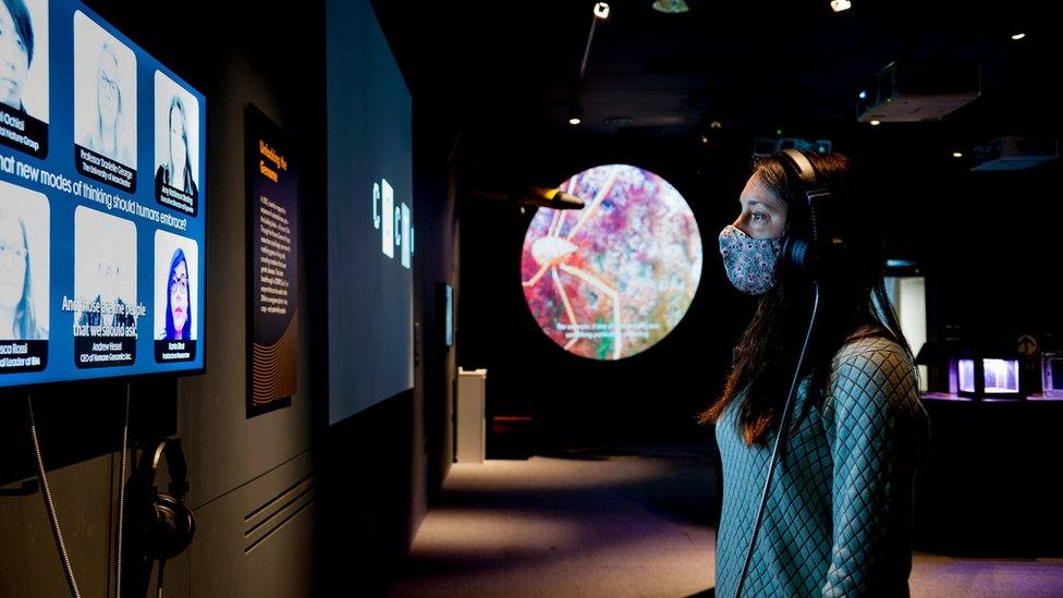 Woman looking at display