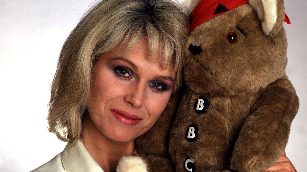 Joanna Lumley holds one of the original Pudsey Bears