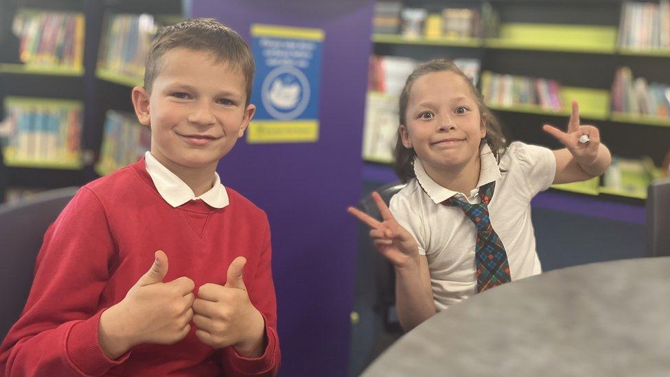 Kids in their new classroom