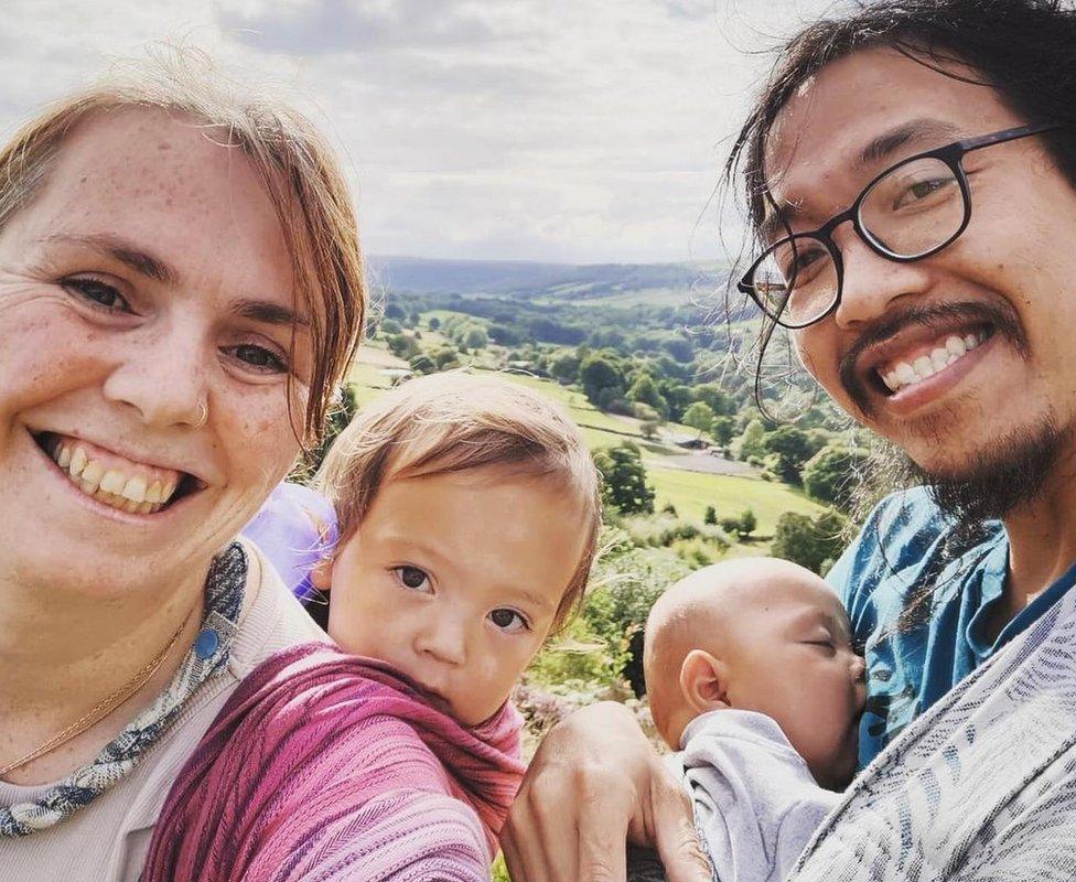 Anna and William Nham with their two young children