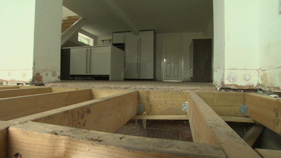 Interior of home damaged by flood water