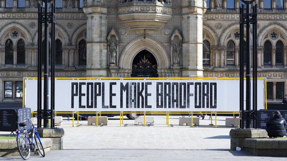 A 'people make Bradford' sign in Bradford city centre