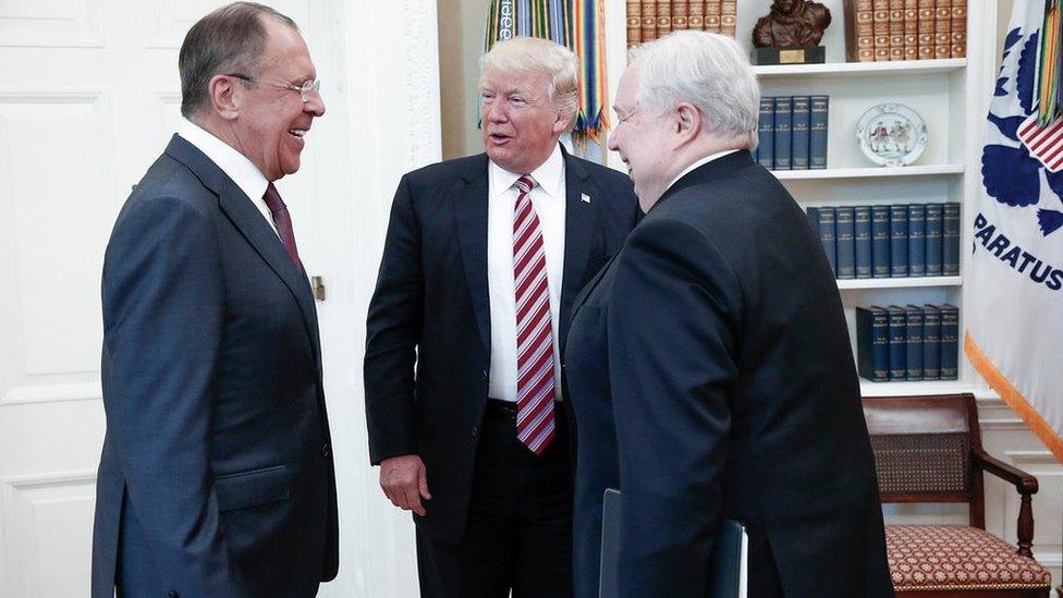 A handout photo made available by the Russian Foreign Ministry on May 10, 2017 shows US President Donald J. Trump (C) speaking with Russian Foreign Minister Sergei Lavrov (L) and Russian Ambassador to the U.S. Sergei Kislyak during a meeting at the White House in Washington, DC.