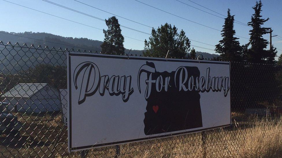 A sign reads "Pray for Roseburg" in Roseburg, Oregon on 2 October 2015