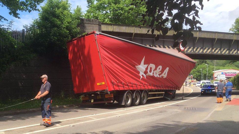 A picture of a lorry wedged under one of the bridges in June 2016