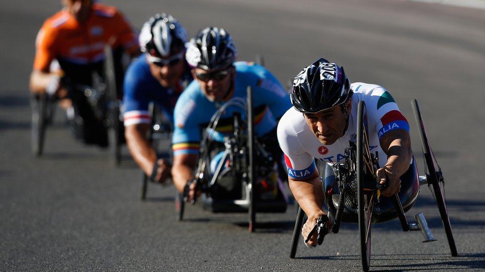 Alessandro Zanardi of Italy (R) rides in the Men's Individual H 4 Road Race on day 9 of the London 2012 Paralympic Games at Brands Hatch