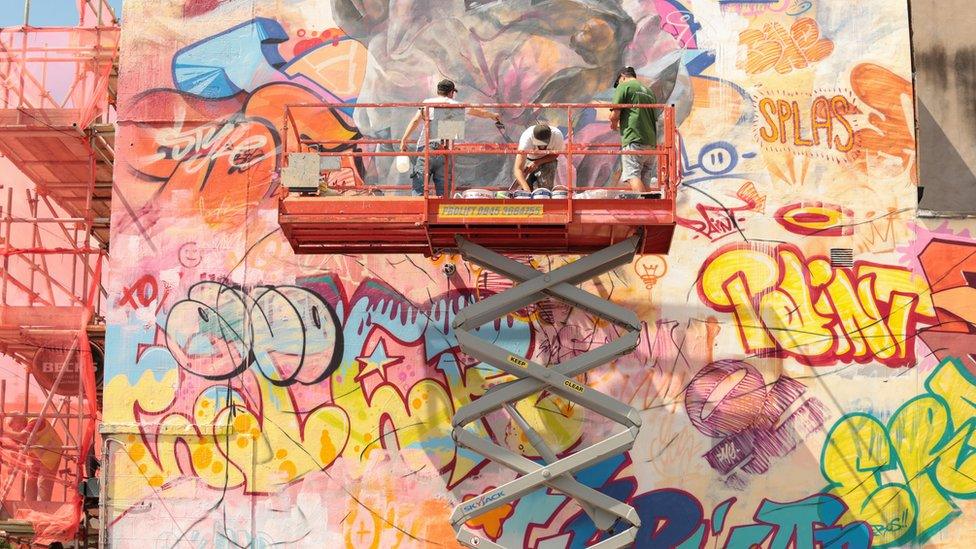 Graffiti artists at work