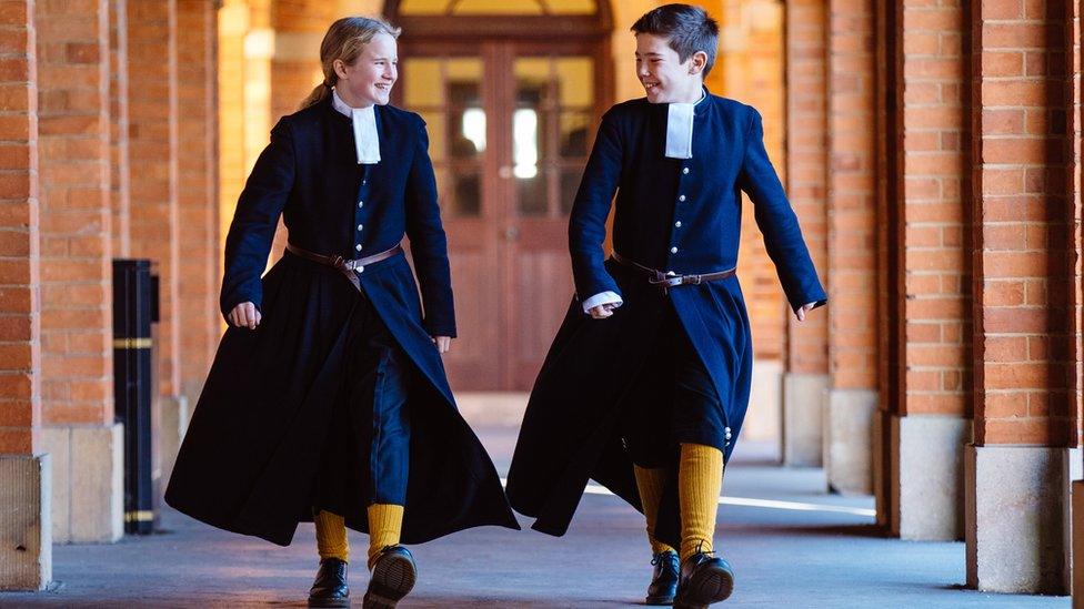 Girl and boy in uniform