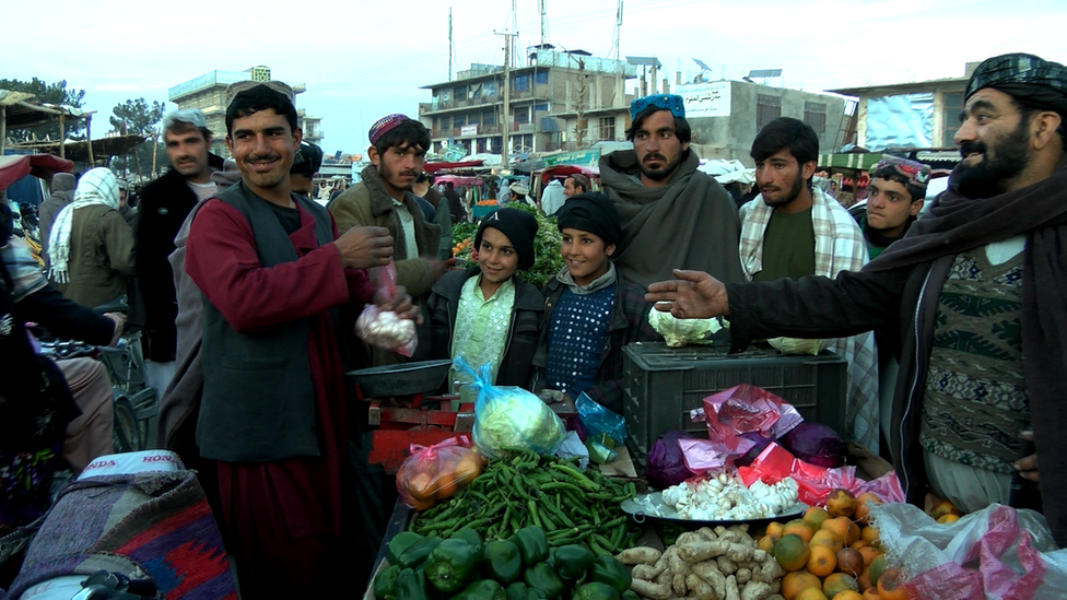 Kandahar vegetable market is busy, but some residents are thinking about leaving