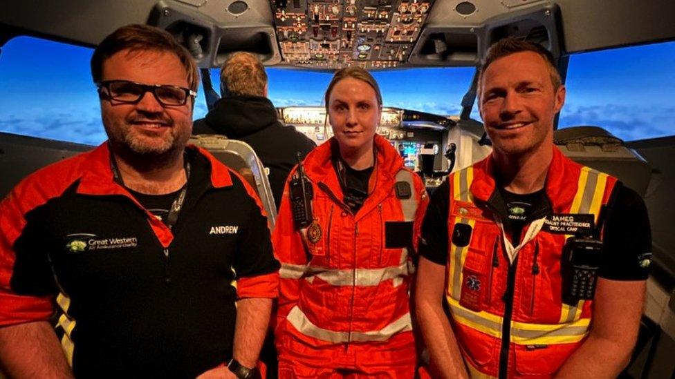 Members of Team Velocity in the Boeing 737 simulator.