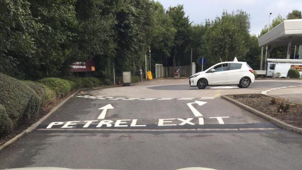 A road sign reading 'Petrel' and 'Exit'