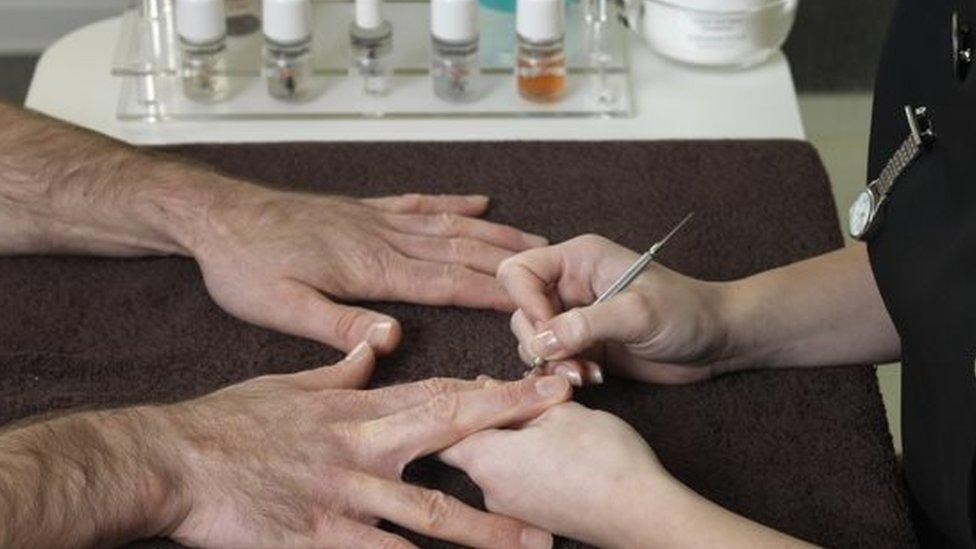 A person having a manicure