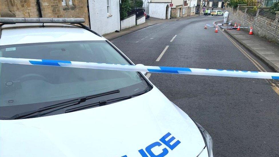 Police car at scene of assault in Stamford