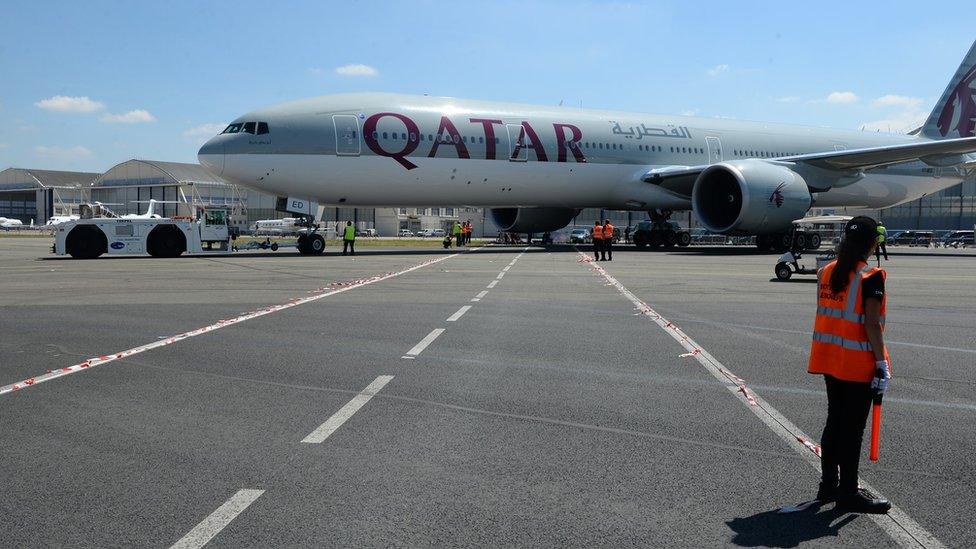 A Qatar Airways plane on the tarmac