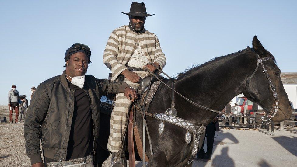 Jeymes Samuel and Idris Elba filming The Harder They Fall