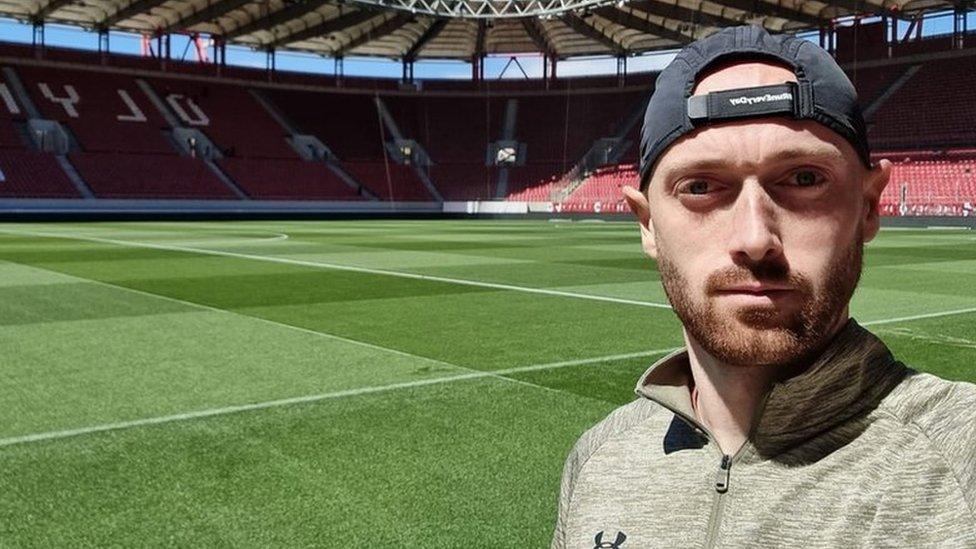 Andrew pitcured at the Georgios Karaiskakis Football Stadium in Greece