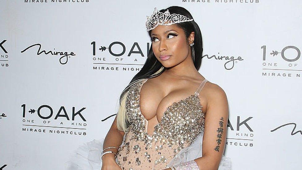 Nicki Minaj posing in a crown