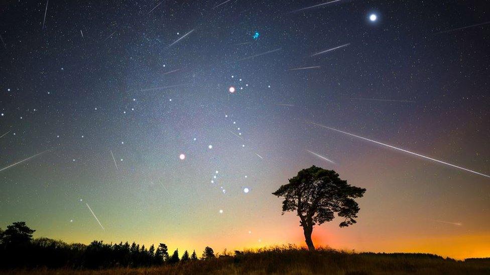 Geminid meteor shower seen across a night sky in Mendips, Somerset