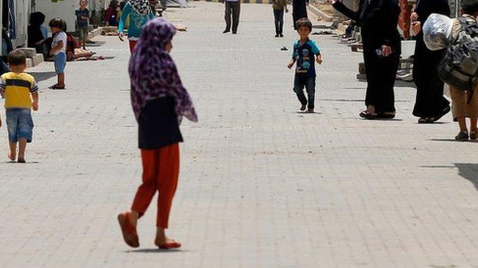 yrian refugees go about their lives at the Oncupinar camp for Syrian refugees next to the border crossing with Syria, near the town of Kilis in southeastern Turkey, Monday, June 20, 2016.